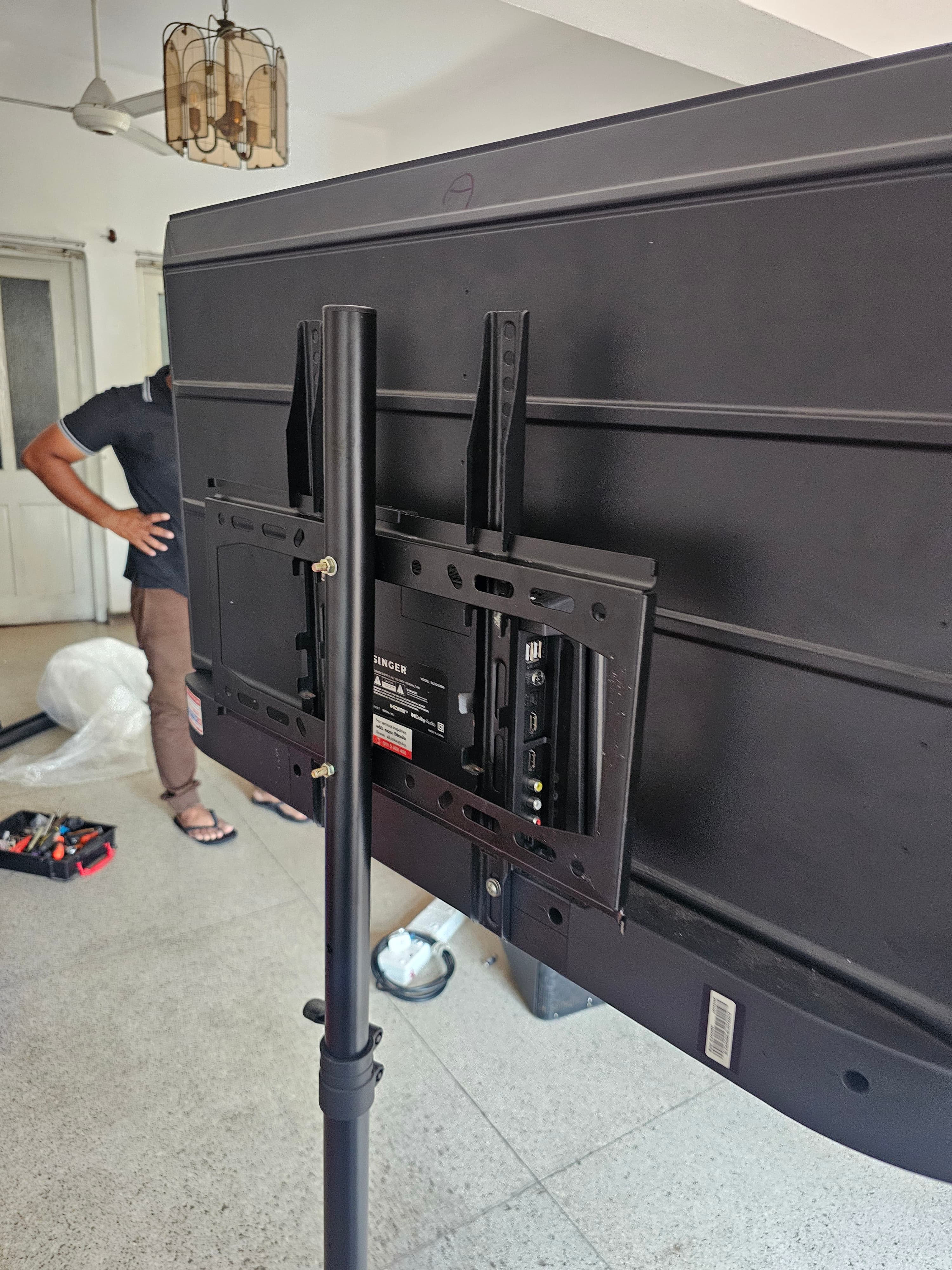 TV Tripod Stand Heavy Duty 43"-55" Setup in action 4